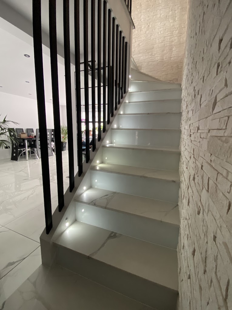 Finished staircase lighting installation — example of completed electrical work by London BS Ltd in Dunstable